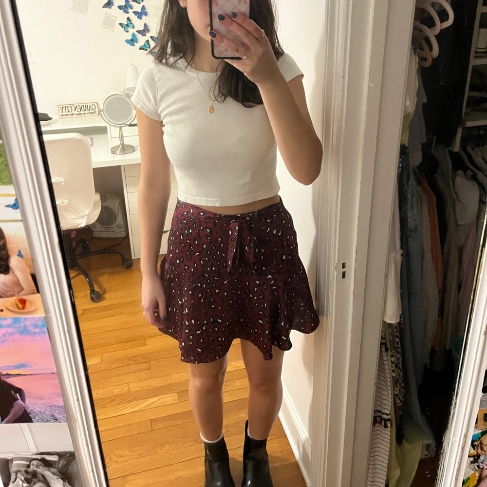 maroon leopard printed skirt with ruffle and waist tie! shorts built in